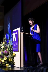 Woman speaking from podium at University of Washington Evans School event