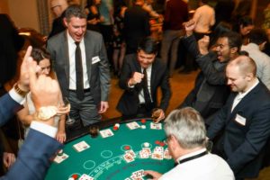 Employees having fun with gambling at their corporate party