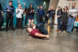 Man dancing on floor at corporate event at Seattle Aquarium