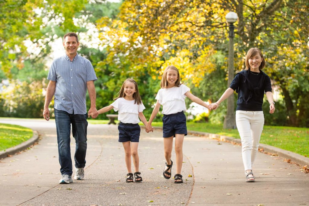 Family smiling and walking in Ballard
