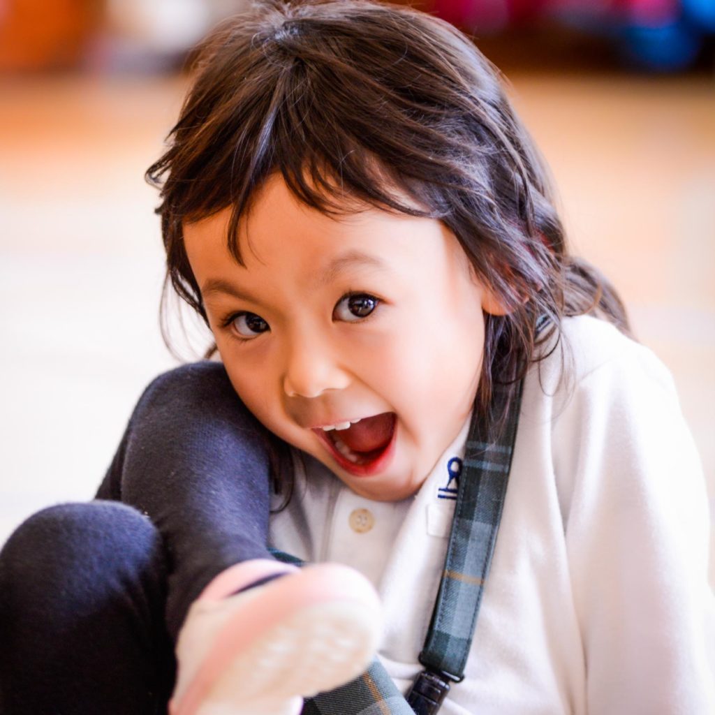meysen academy student smiles for the camera in Japan