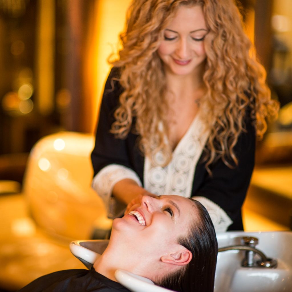 photo of model getting hair washed at hair-by-joey salon