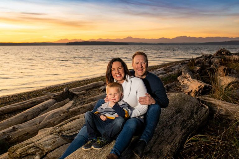 Family enjoying sunset at Lincoln Park in West Seattle