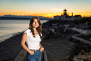 Portrait of woman by a lighthouse in seattle