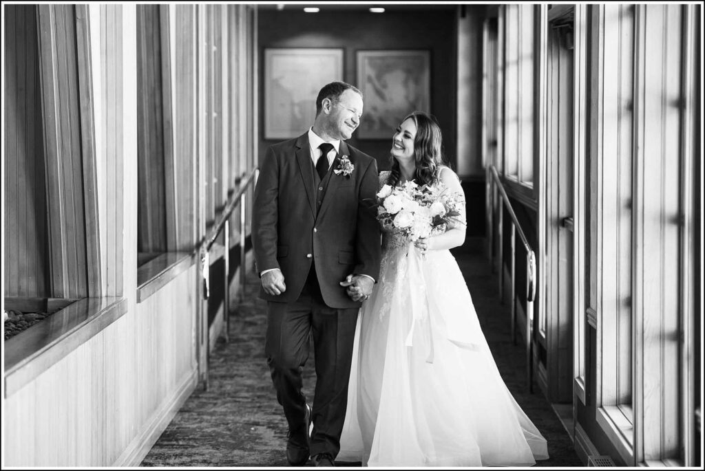 married couple walking together at semiahmoo resort in blaine, washington