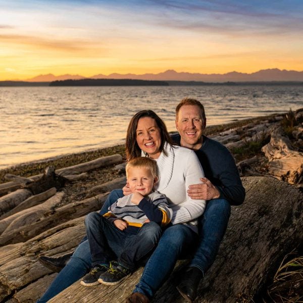 Family enjoying sunset at Lincoln Park in West Seattle