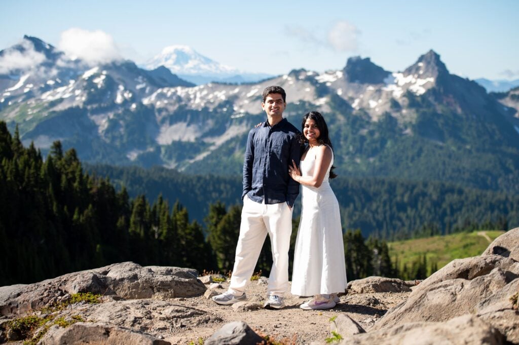 Couple facing camera with mt. adams in the background